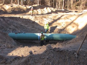 men&pipe in ditch